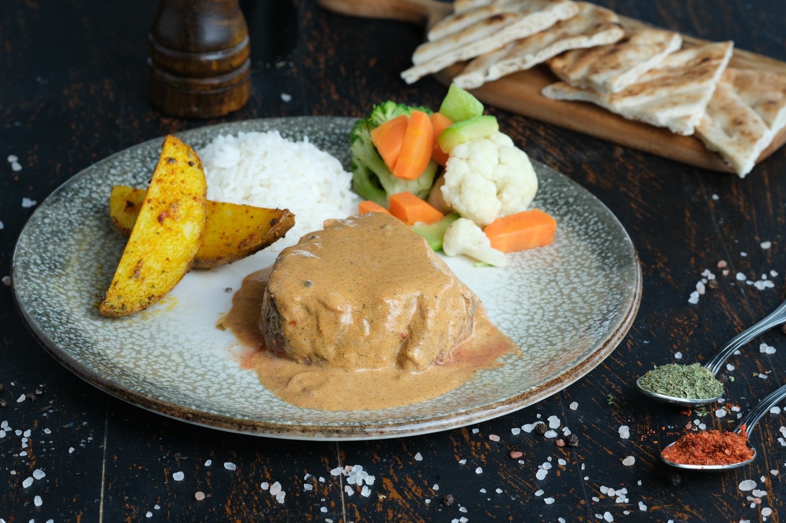 Queb Rooftop - pepper steak with creamy peppercorn sauce, rice, potato wedges and vegetables