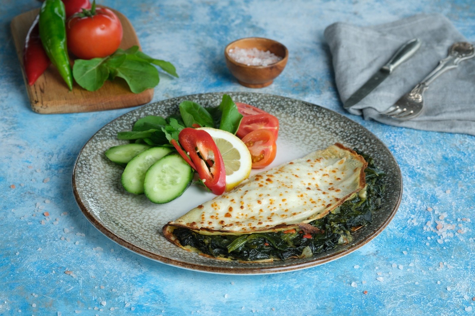 Vegetarian Dining at Queb Rooftop: A Meat-Free Guide to Sultanahmet 2 Queb Rooftop - baked spinach crepe with cheese, served with cucumber, tomato and lemon
