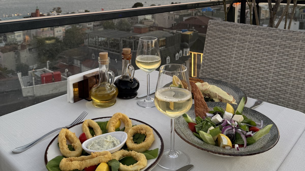 Queb Lounge - starters on a terrace table overlooking Sultanahmet at sunset