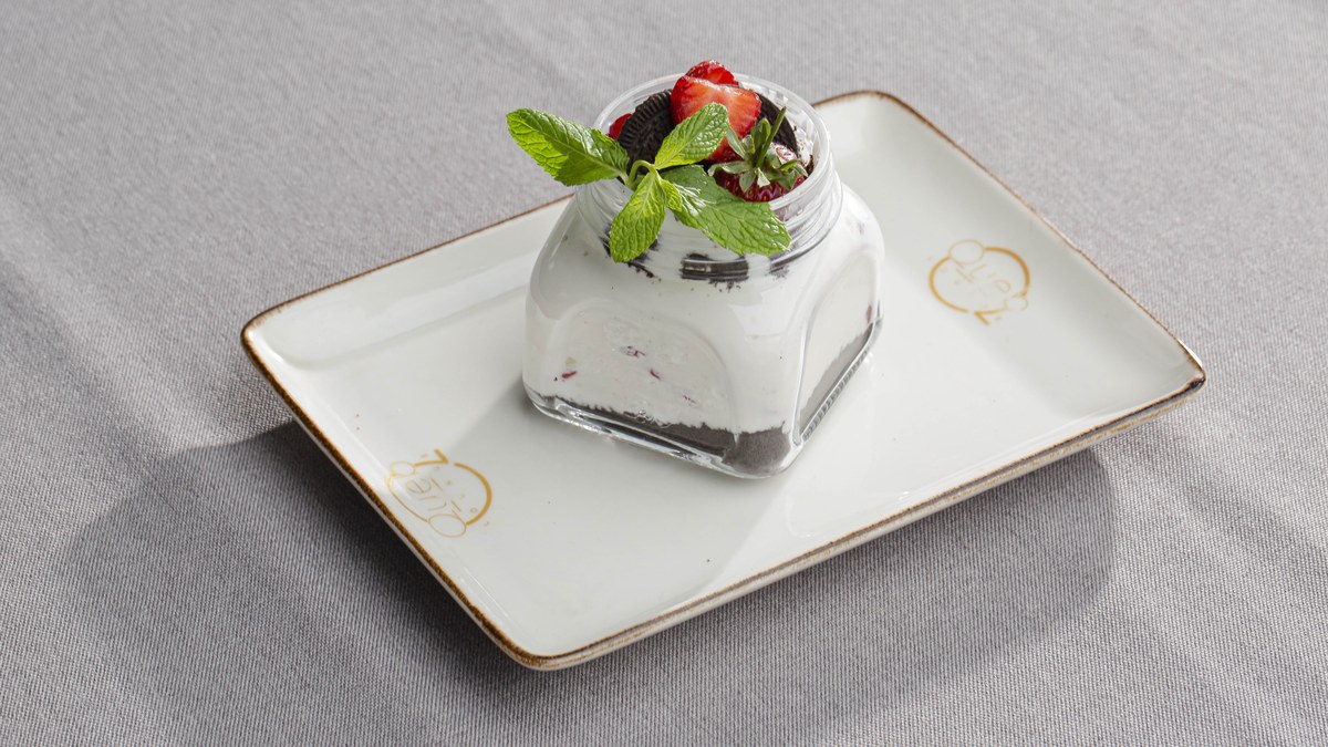 Queb Lounge - cheesecake served in a glass jar at Queb Rooftop